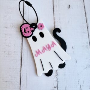 Personalized cat Halloween bag tag with custom name and glow-in-the-dark option