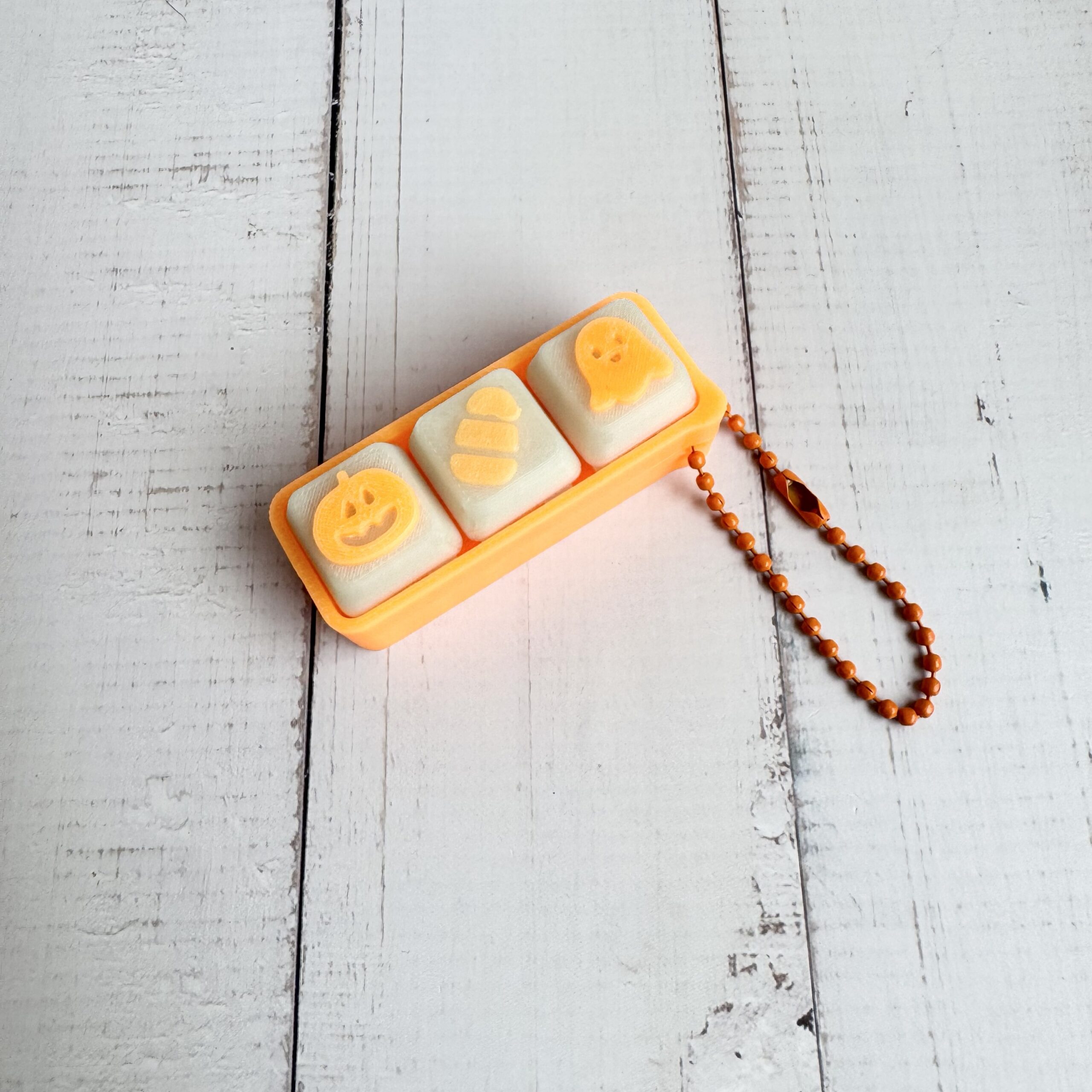 Glow in the dark Halloween clicker trio with pumpkin acorn and leaf